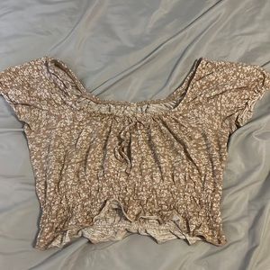 The last pic is super bright. The color is a brownish pink. size small